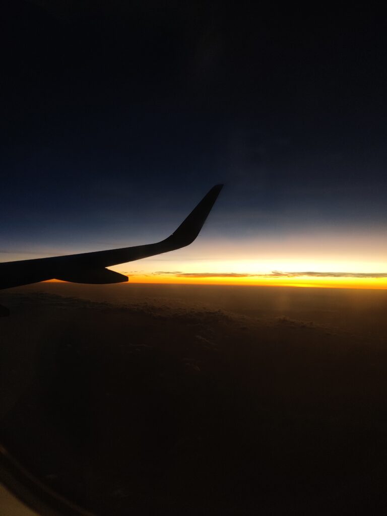 TRAVEL AIRPLANE SUNSET FROM AIRPLANE